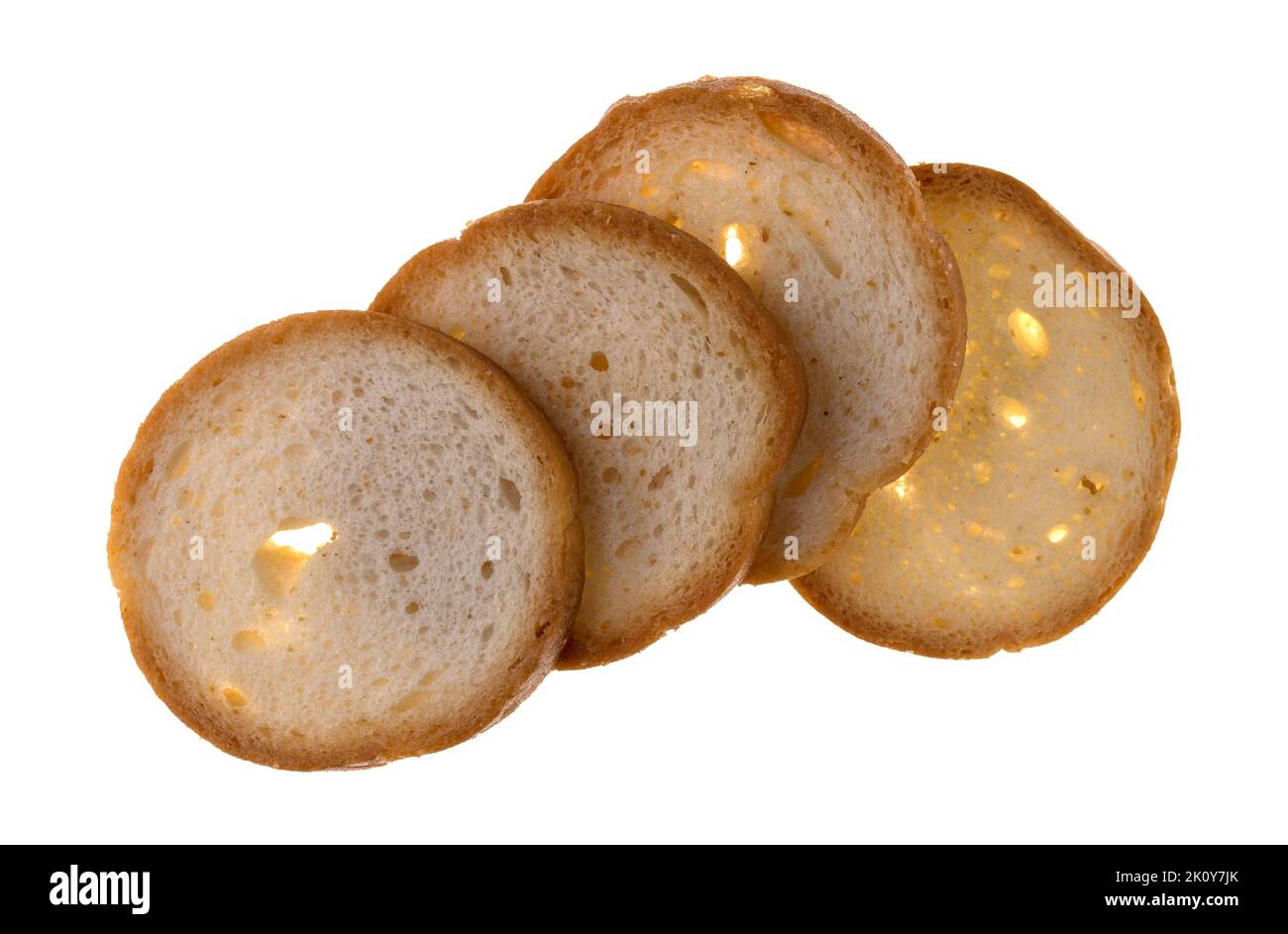 Four round toasted crackers isolated on a white background top view. Stock Photo