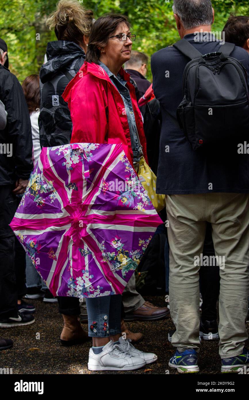 Mourners queue to lay flowers at Buckingham Palace the day after the death of Queen Elizabeth II
