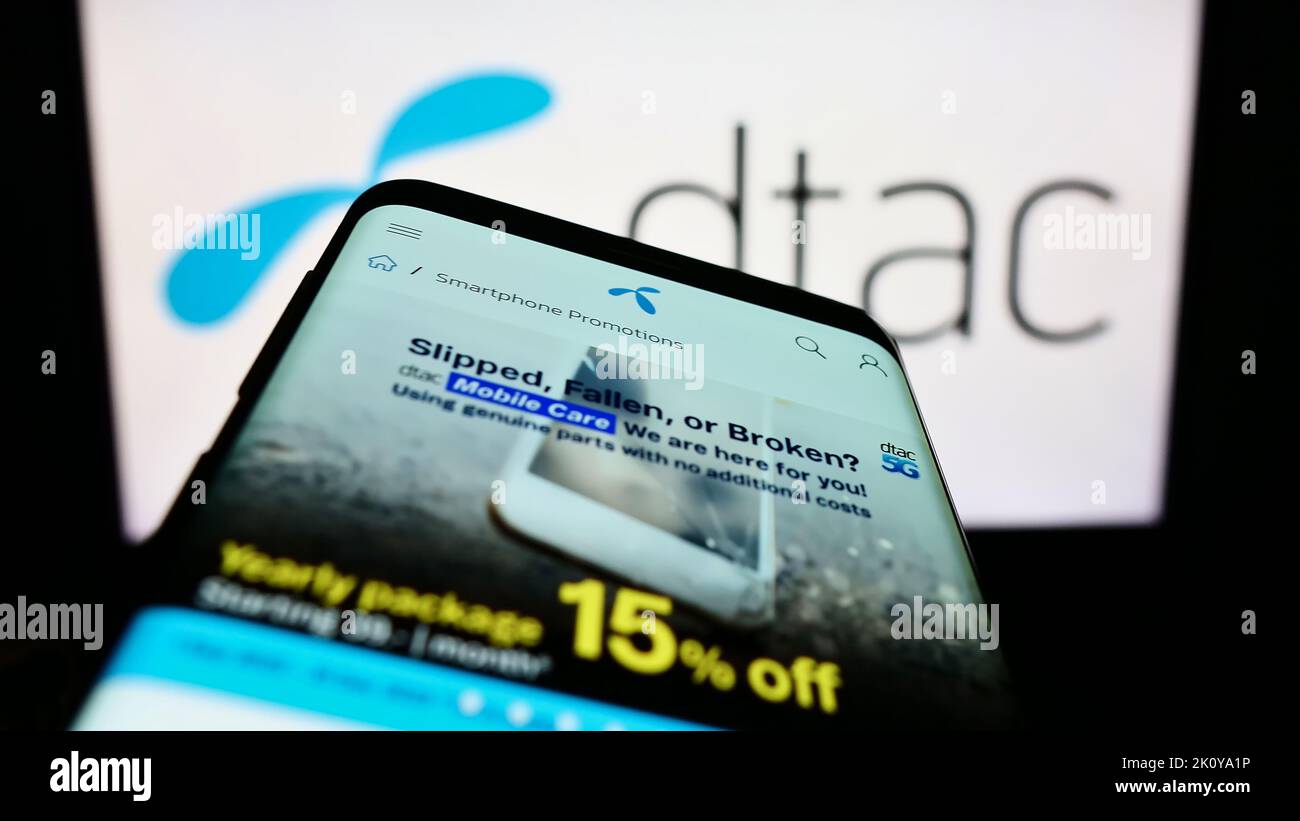 Smartphone with webpage of Total Access Communication Public Company ...