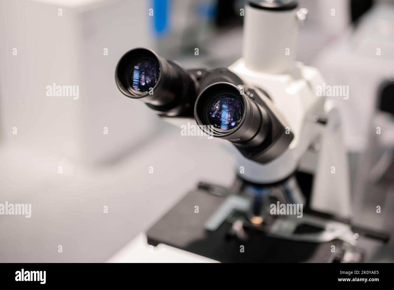 Ocular lens, eyepieces of white optical microscope - close up Stock Photo