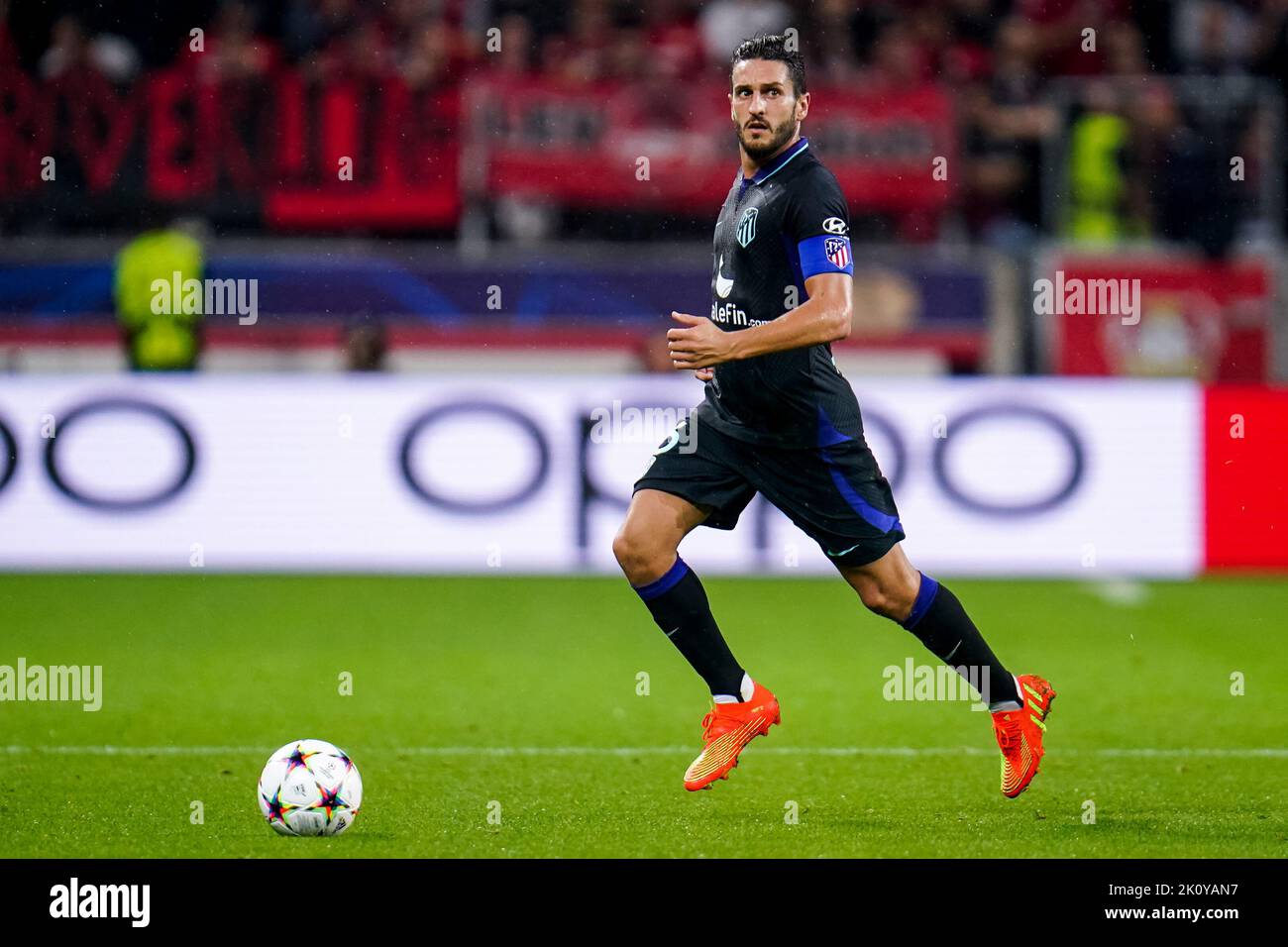 LEVERKUSEN, GERMANY - SEPTEMBER 13: Koke of Atletico Madrid runs with the ball during the UEFA Champions League - Group B match between Bayer Leverkusen and Atletico Madrid at the BayArena on September 13, 2022 in Leverkusen, Germany (Photo by Rene Nijhuis/Orange Pictures) Stock Photo