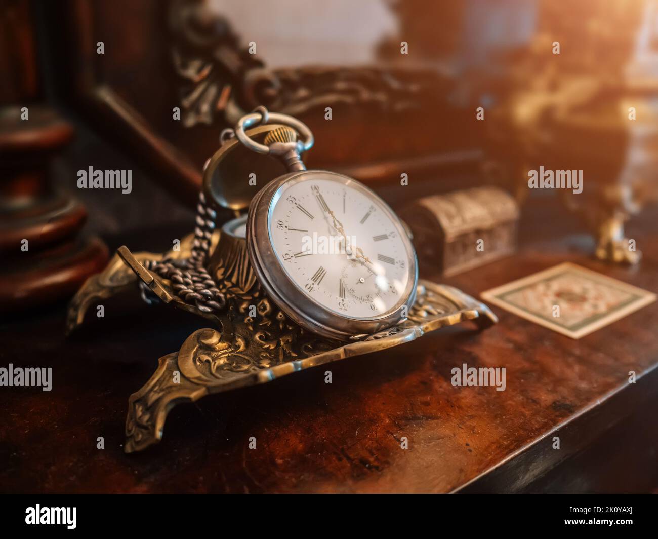 Ancient vintage antique pocket watch or clock close up. Stock Photo