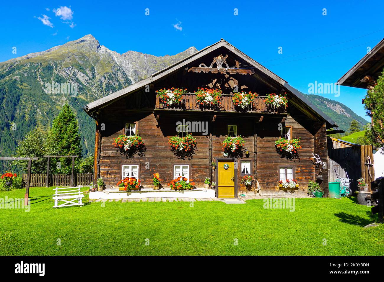 Old wooden house with geraniums at Bergstein, near Langenfeld, in the Otztal Valley, the Tirol, Austria, EU, the European Alps Stock Photo