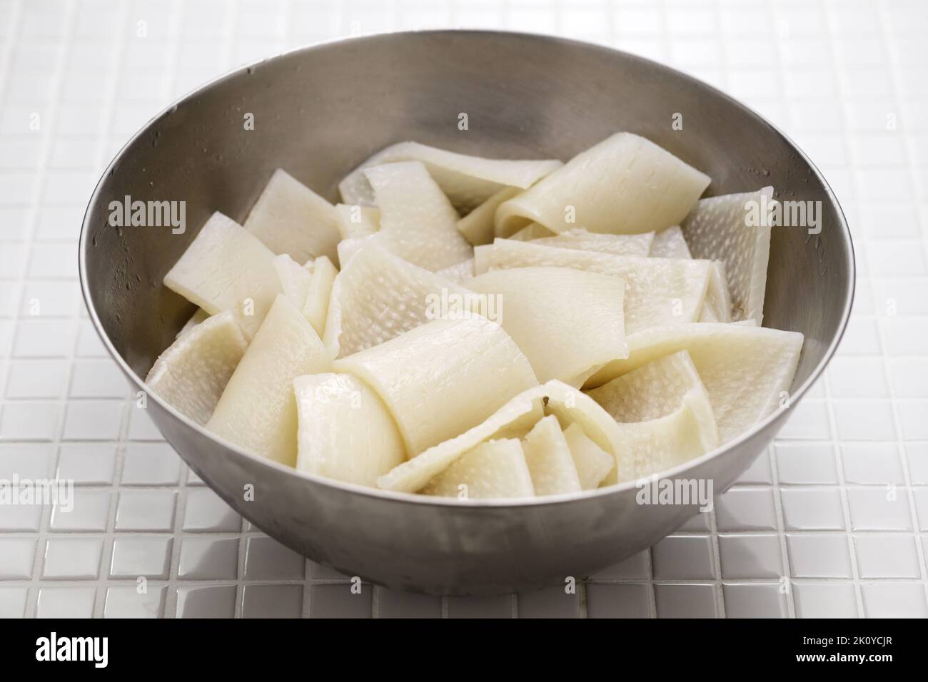 Pork rinds in a bowl. Ingredients for Cueritos (Mexican vinegared pickled pork rinds). Stock Photo