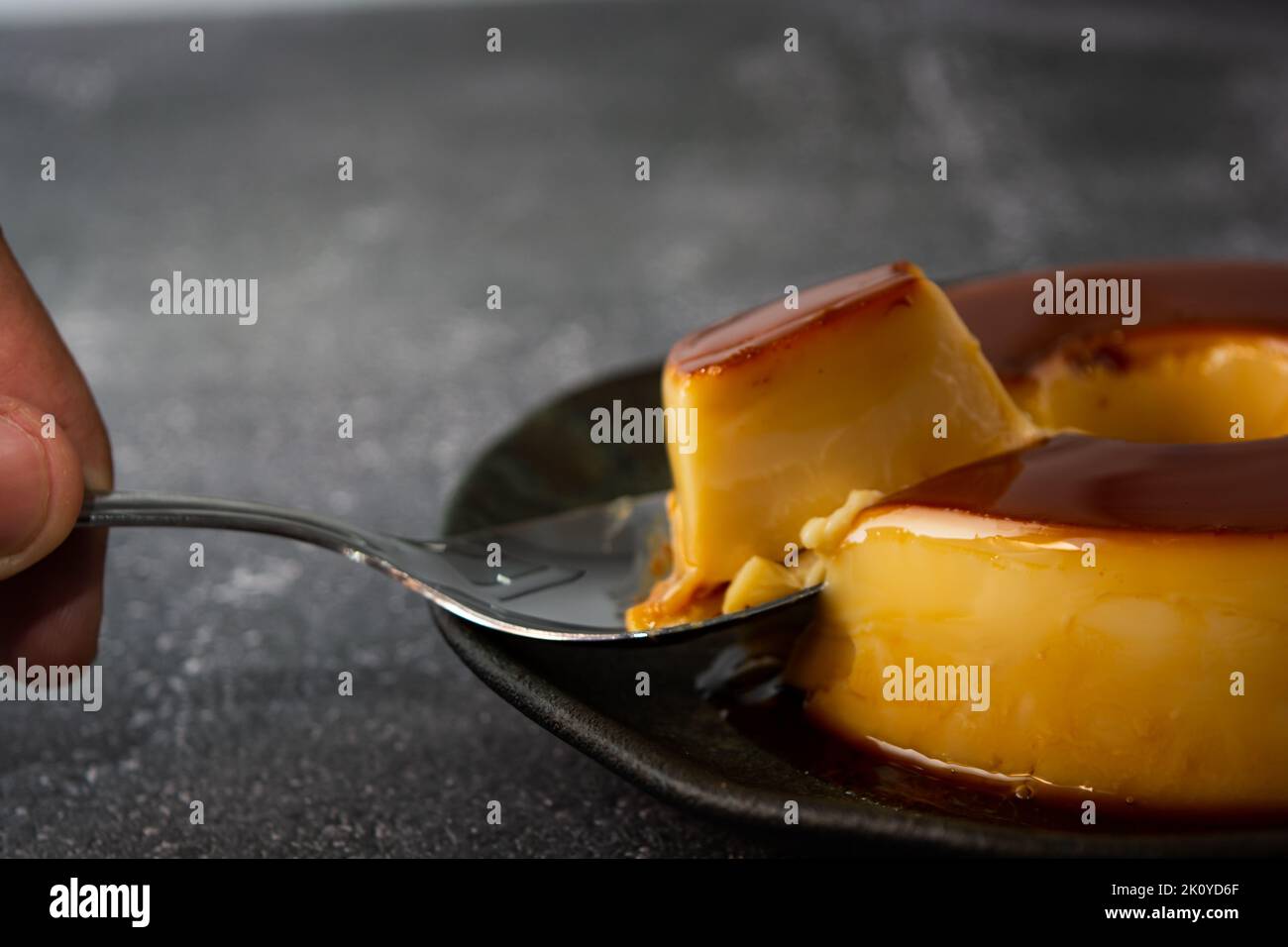 https://c8.alamy.com/comp/2K0YD6F/pudim-de-leite-or-milk-pudding-traditional-brazilian-dessert-with-caramel-also-known-as-flan-high-angle-view-2K0YD6F.jpg