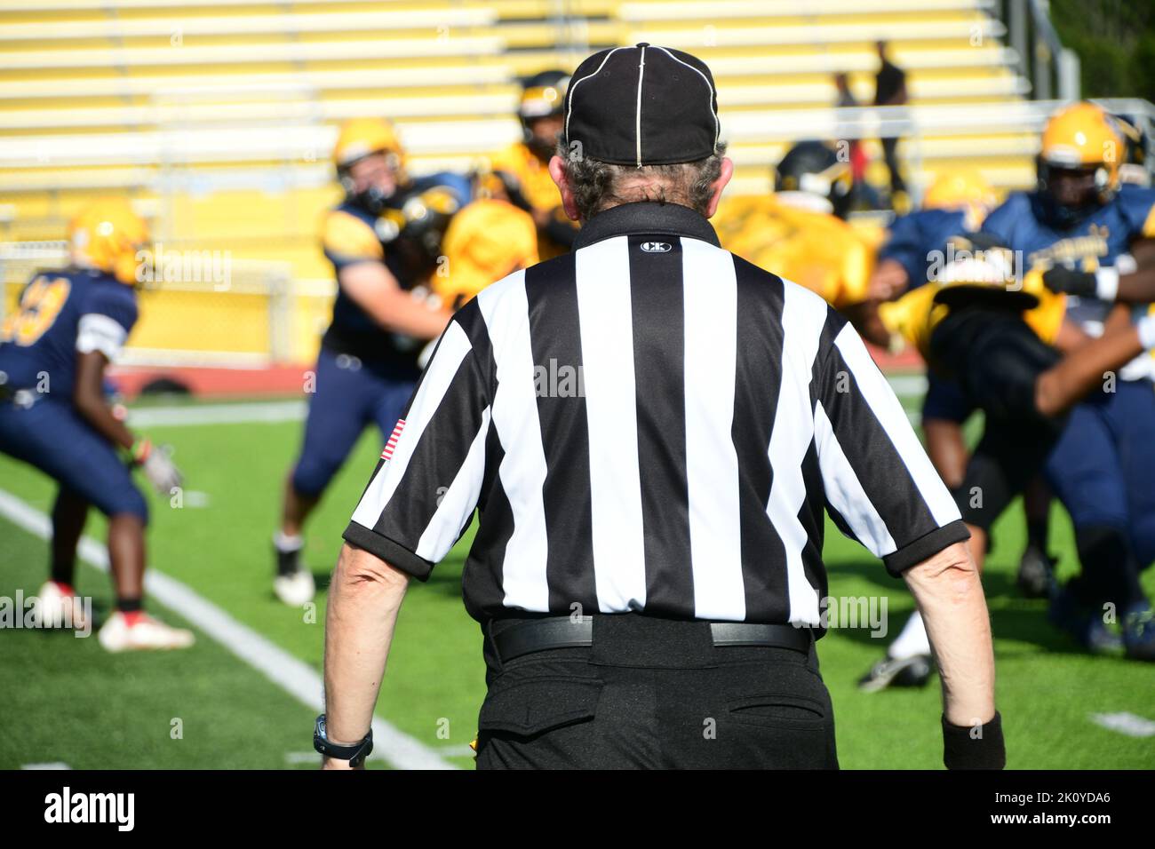 Back of football referee during a football game Stock Photo Alamy