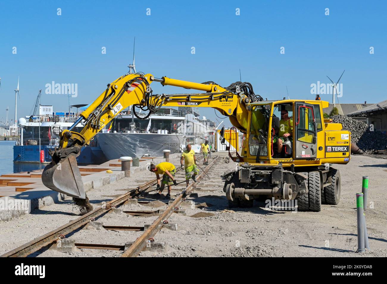 Antwerp, Belgium - August 2022: Mechanical digger working on a construction site alongside one of the city's harbours Stock Photo
