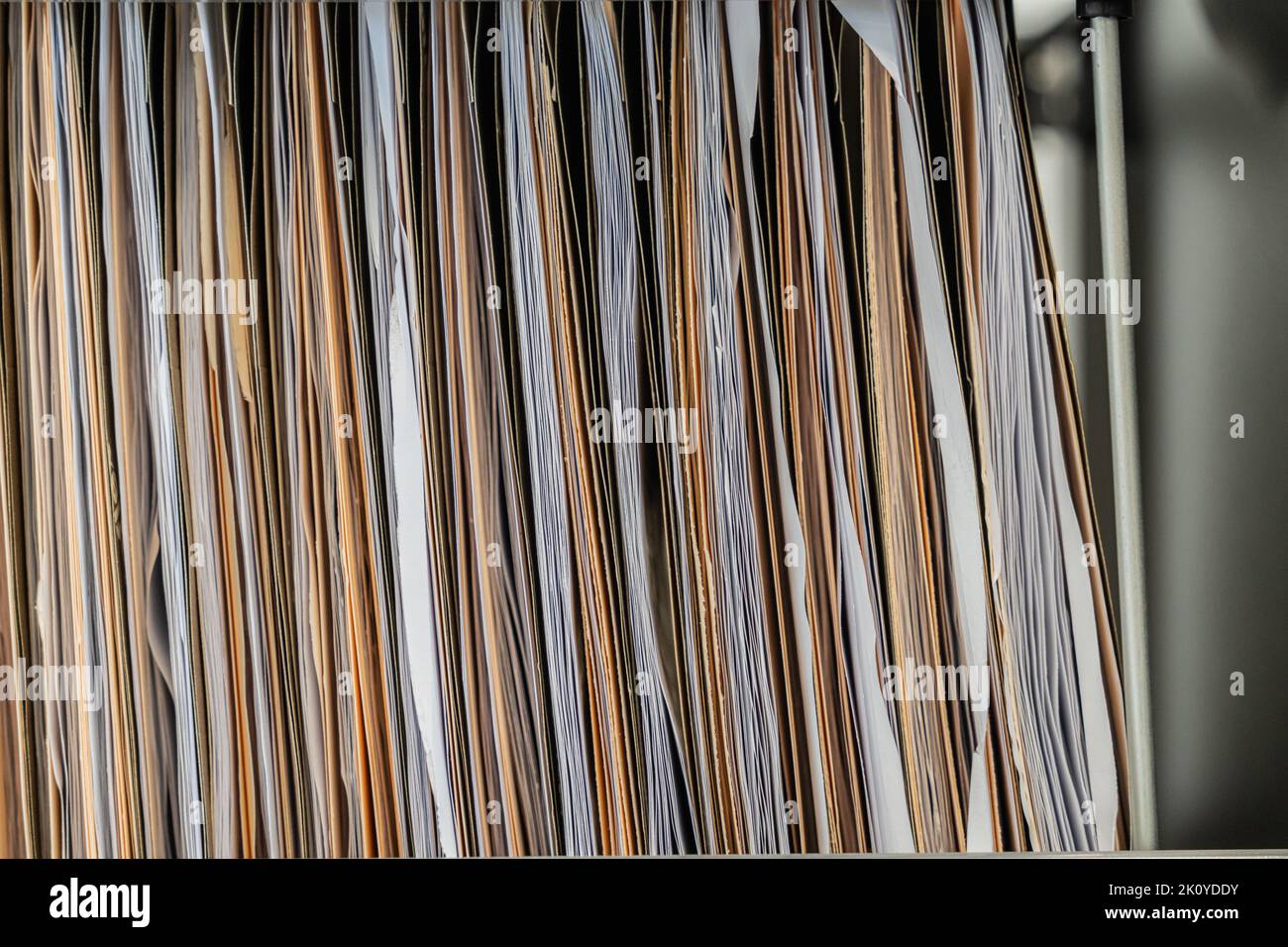 Hanging files in filling cabinet with documents Stock Photo