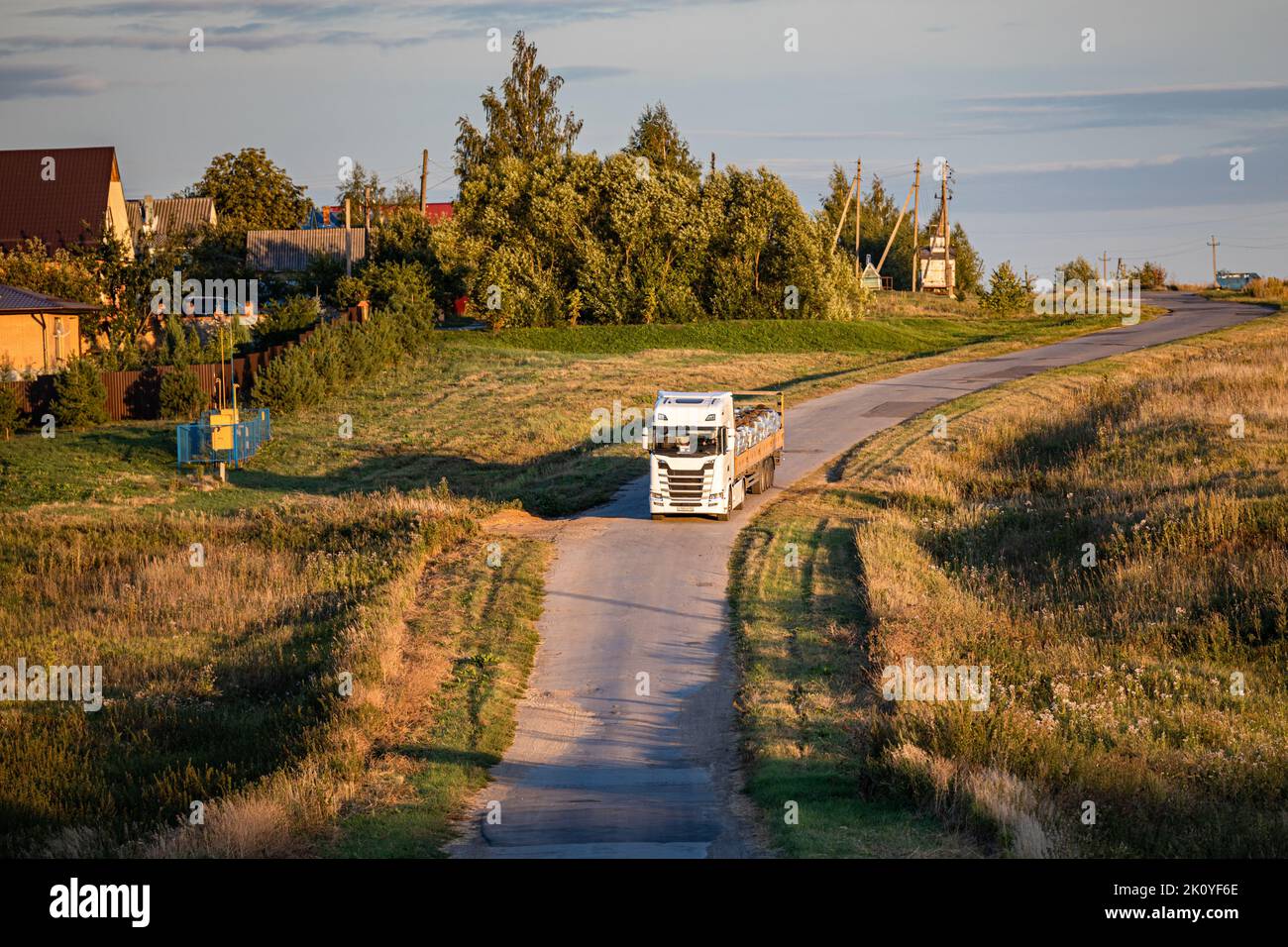 Ryazan Russia - August 31, 2022: truck driving on a country road . trailer truck driving outside the city Stock Photo