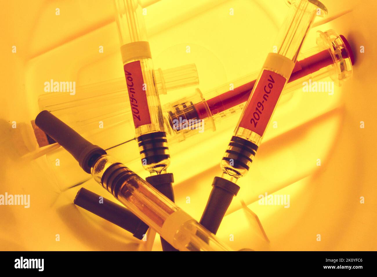 Syringes inside a Sharps Collector Stock Photo