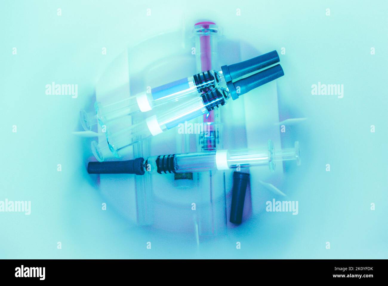 Syringes inside a Sharps Collector Stock Photo