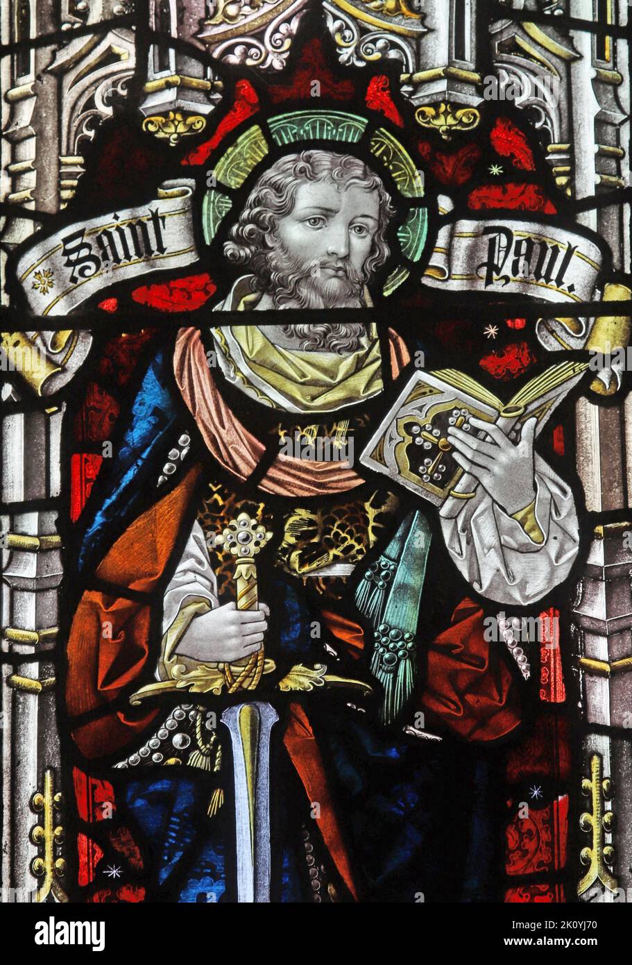 Stained glass window by Percy Bacon & Brothers depicting St Paul, Mawgan-in-Pyder, Cornwall Stock Photo