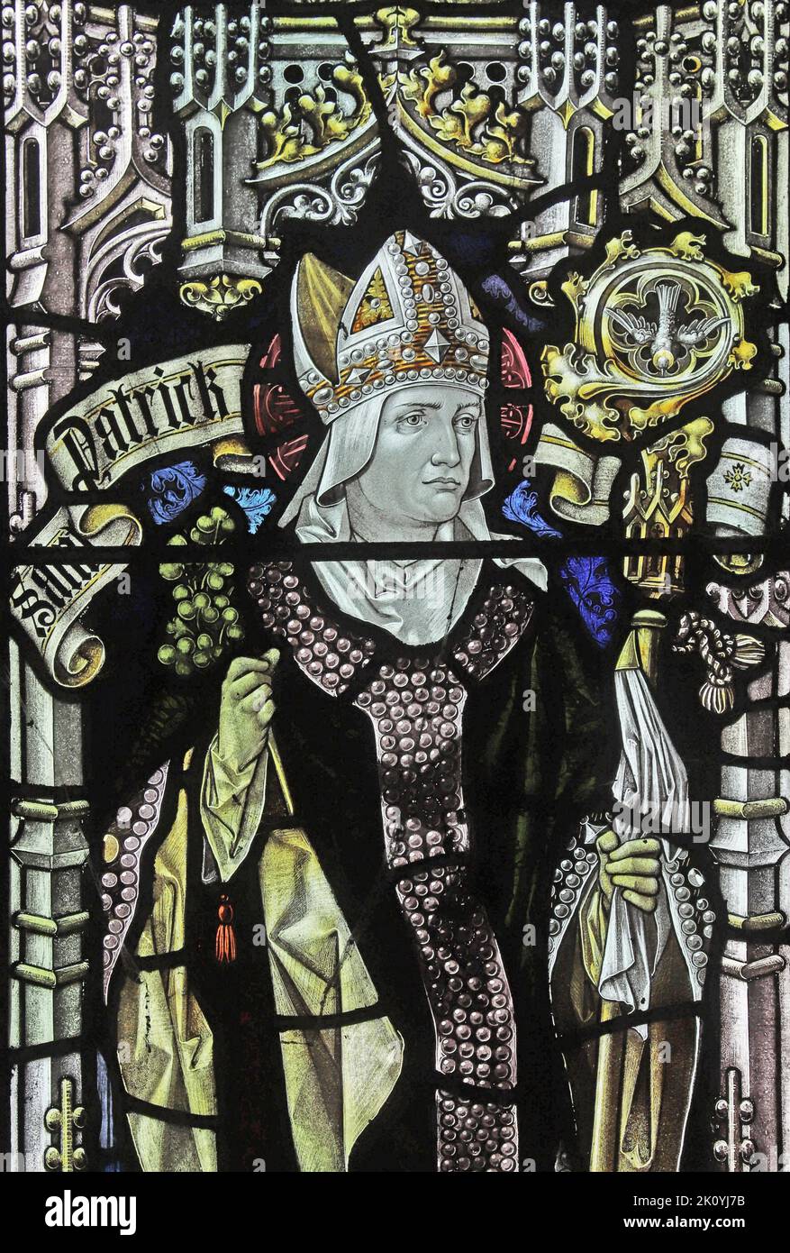 Stained glass window by Percy Bacon & Brothers depicting St Patrick, Mawgan-in-Pyder, Cornwall Stock Photo
