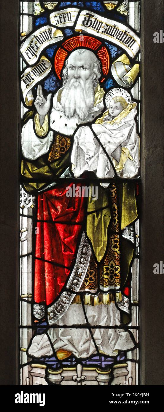 Stained glass window by Percy Bacon & Brothers depicting Christ's Presentation in the Temple, Church of St Ladoca, Ladock, Cornwall Stock Photo