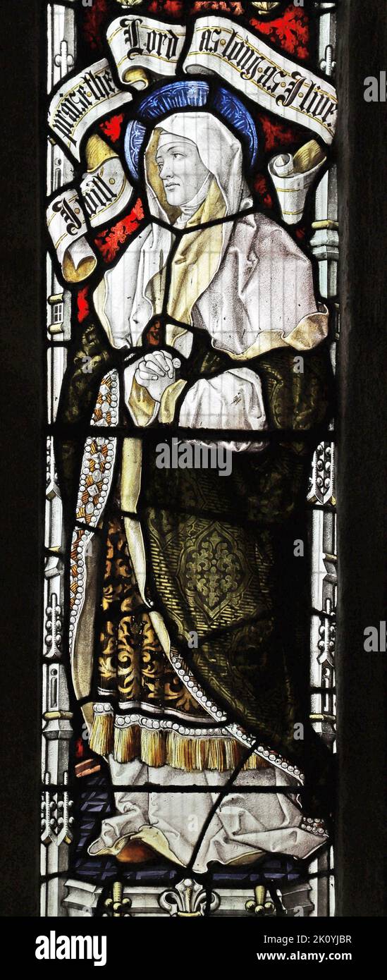 Stained glass window by Percy Bacon & Brothers depicting St Anne at the presentation in the Temple, Church of St Ladoca, Ladock, Cornwall Stock Photo