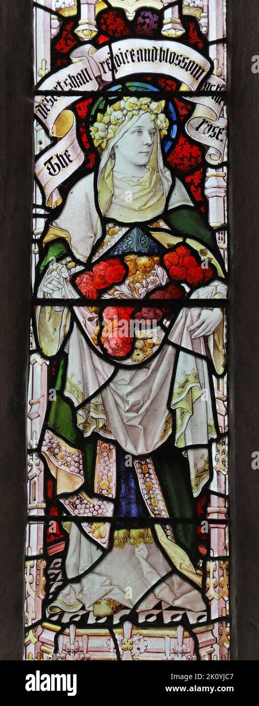Stained glass window by Percy Bacon & Brothers depicting The Virtue, Faith, Church of St Ladoca, Ladock, Cornwall Stock Photo