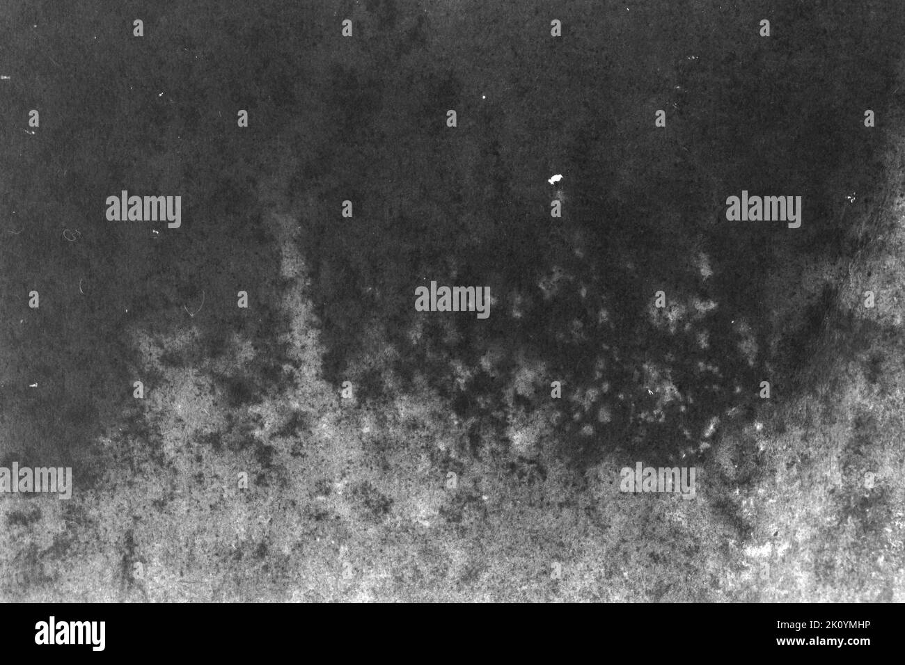 black and white texture of old paper with water stains as a background ...