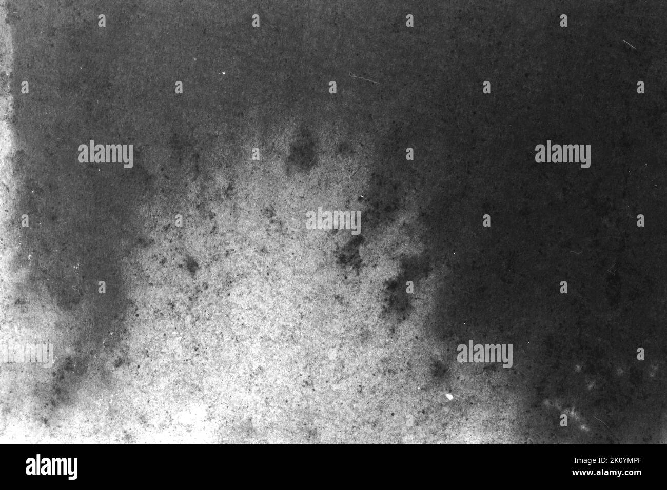 black and white texture of old paper with water stains as a background ...
