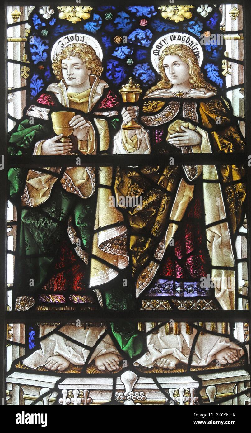 Stained glass window by Percy Bacon & Brothers depicting St John & St Mary Magdalene, All Hallows Church, Kea, Cornwall Stock Photo