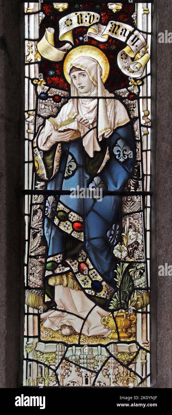 Stained glass window by Percy Bacon & Brothers depicting The Blessed Virgin Mary, St James Church St Kew, Cornwall Stock Photo