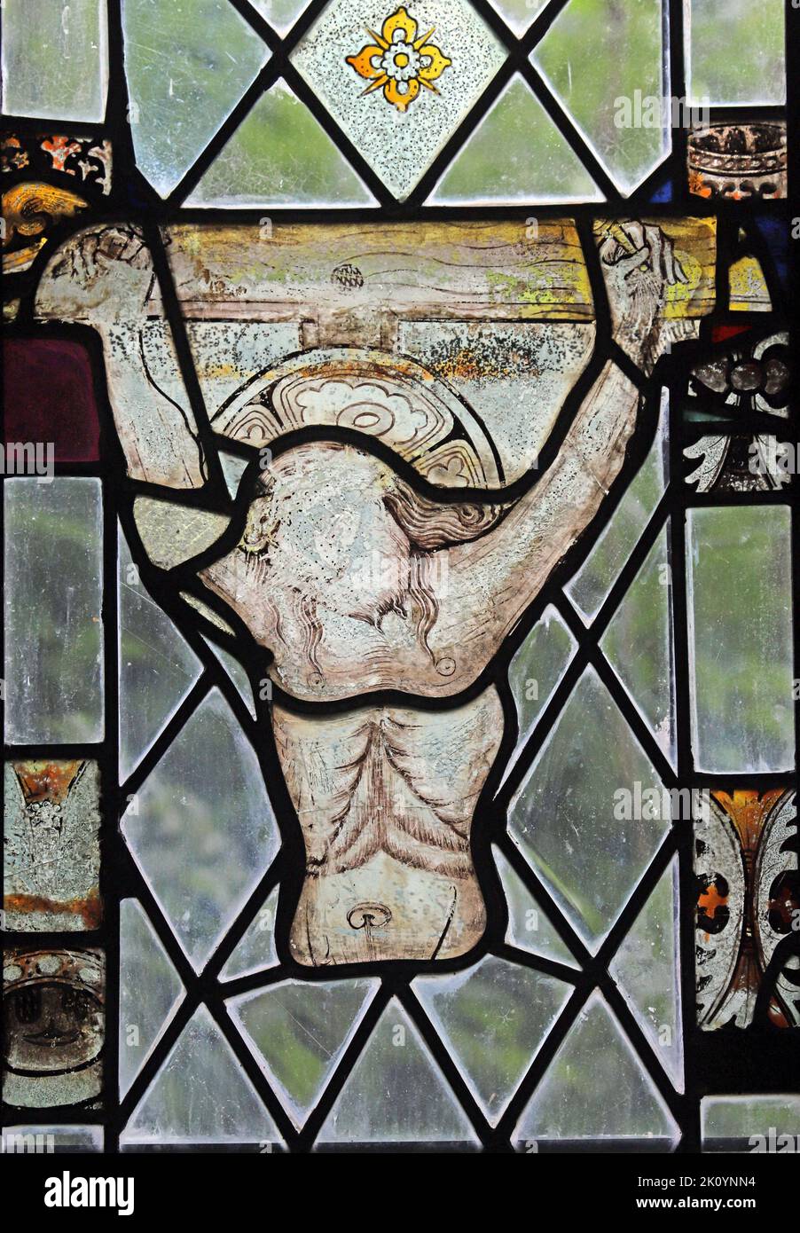 15th century stained glass depicting the crucifixion of Jesus, St Sidwell's Church, Laneast, Cornwall Stock Photo