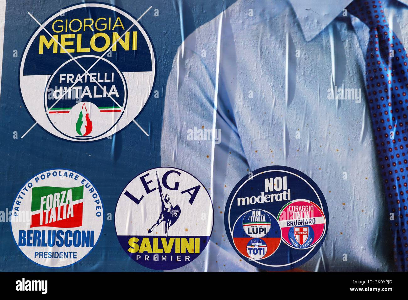 Detail of Italian Election wall poster with symbols of FORZA ITALIA, FRATELLI D'ITALIA, LEGA and NOI MODERATI for Election day of September 25, 2022 Stock Photo