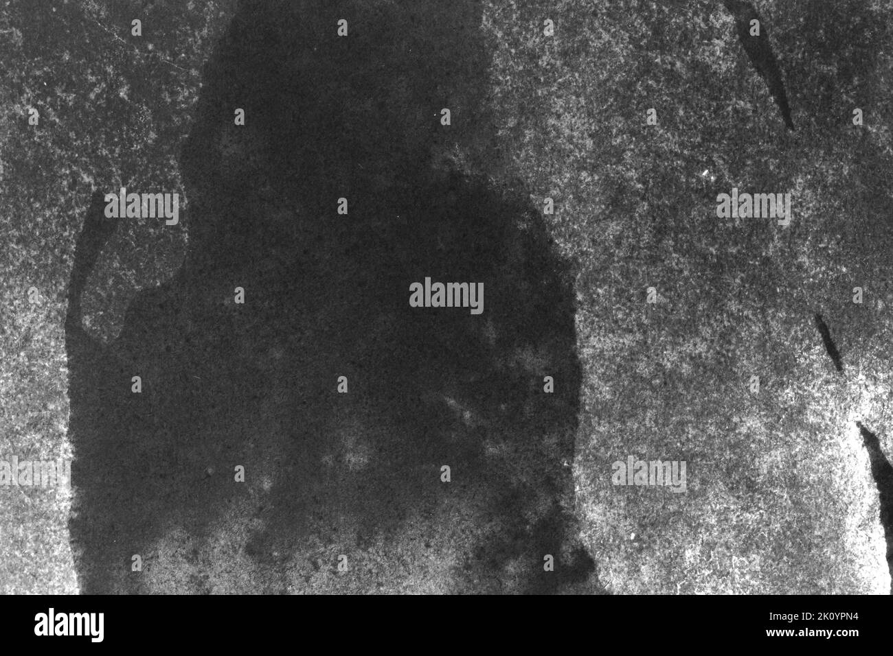 black and white texture of old paper with water stains as a background ...
