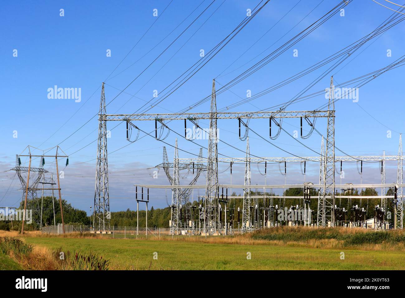 Electricity transmission substation and overhead transmission lines by Fingrid Oyj Forssa Reserve Power Plant. Forssa, Finland. September 9, 2022 Stock Photo