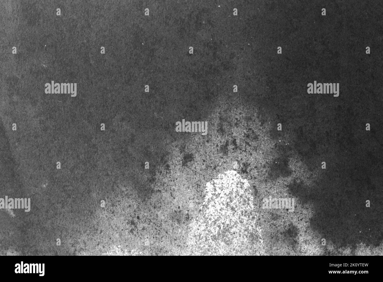 black and white texture of old paper with water stains as a background ...