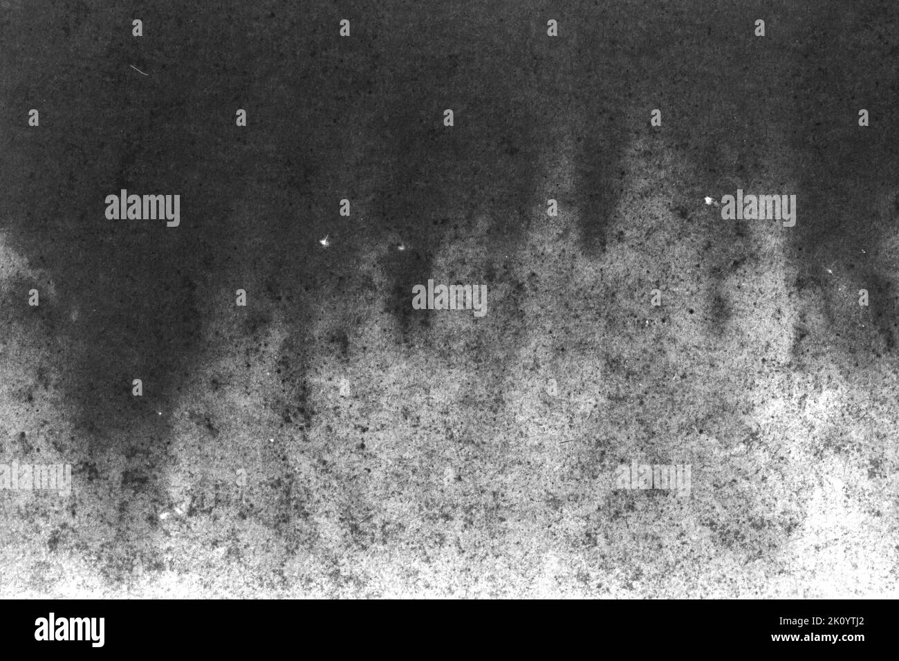 black and white texture of old paper with water stains as a background ...