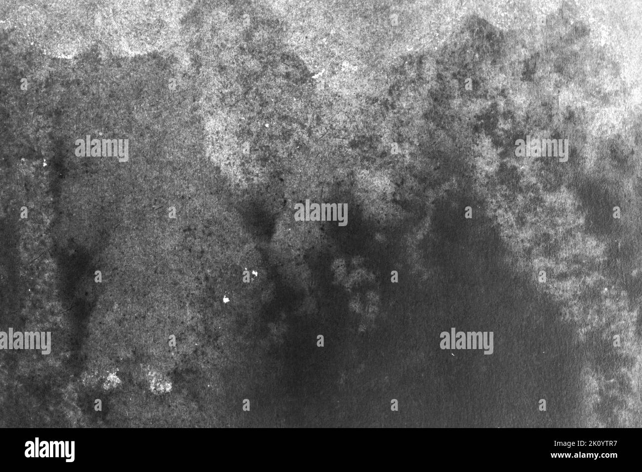 black and white texture of old paper with water stains as a background ...
