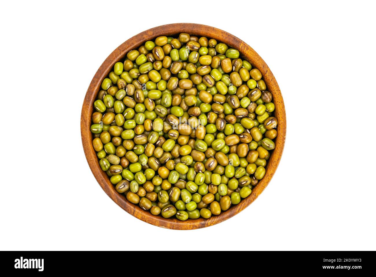 Top view or flat lay pile of fresh green raw mung beans in wooden bowl isolated on white background with clipping path. Stock Photo