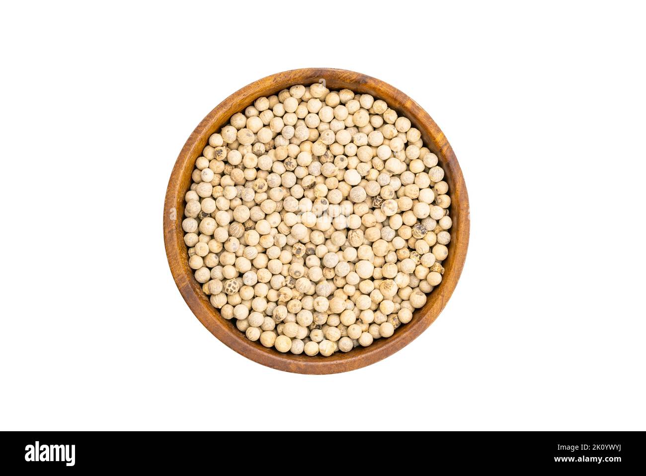 Top view or flat lay of fresh raw white pepper in wooden bowl isolated on white background with clipping path. Stock Photo