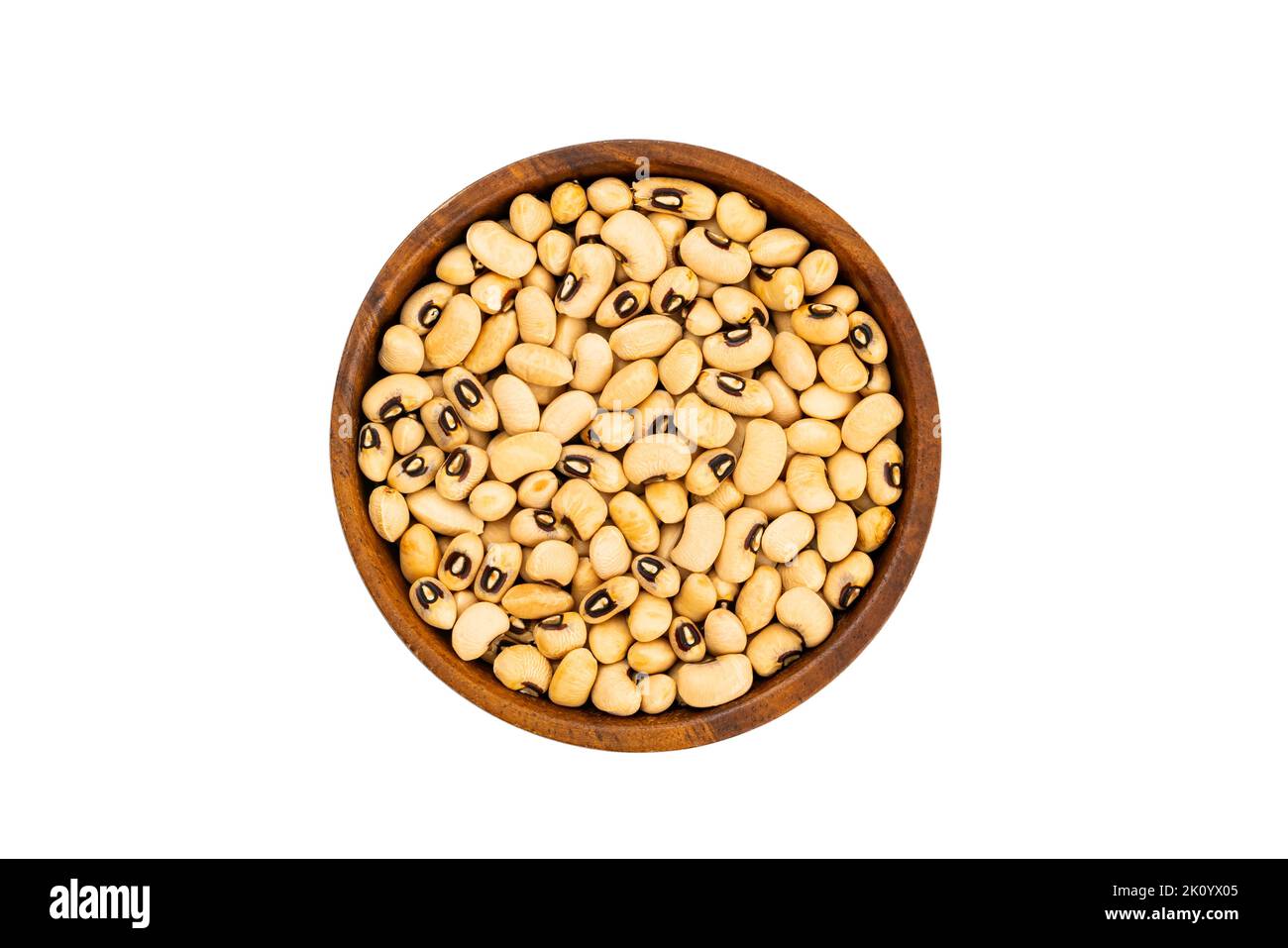 Top view or flat lay of fresh raw white bean in wooden bowl isolated on white background with clipping path. Stock Photo