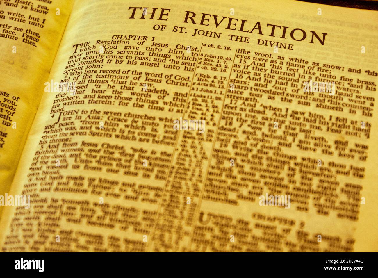 Close up of antique Holy Bible page, shallow depth of field with focus