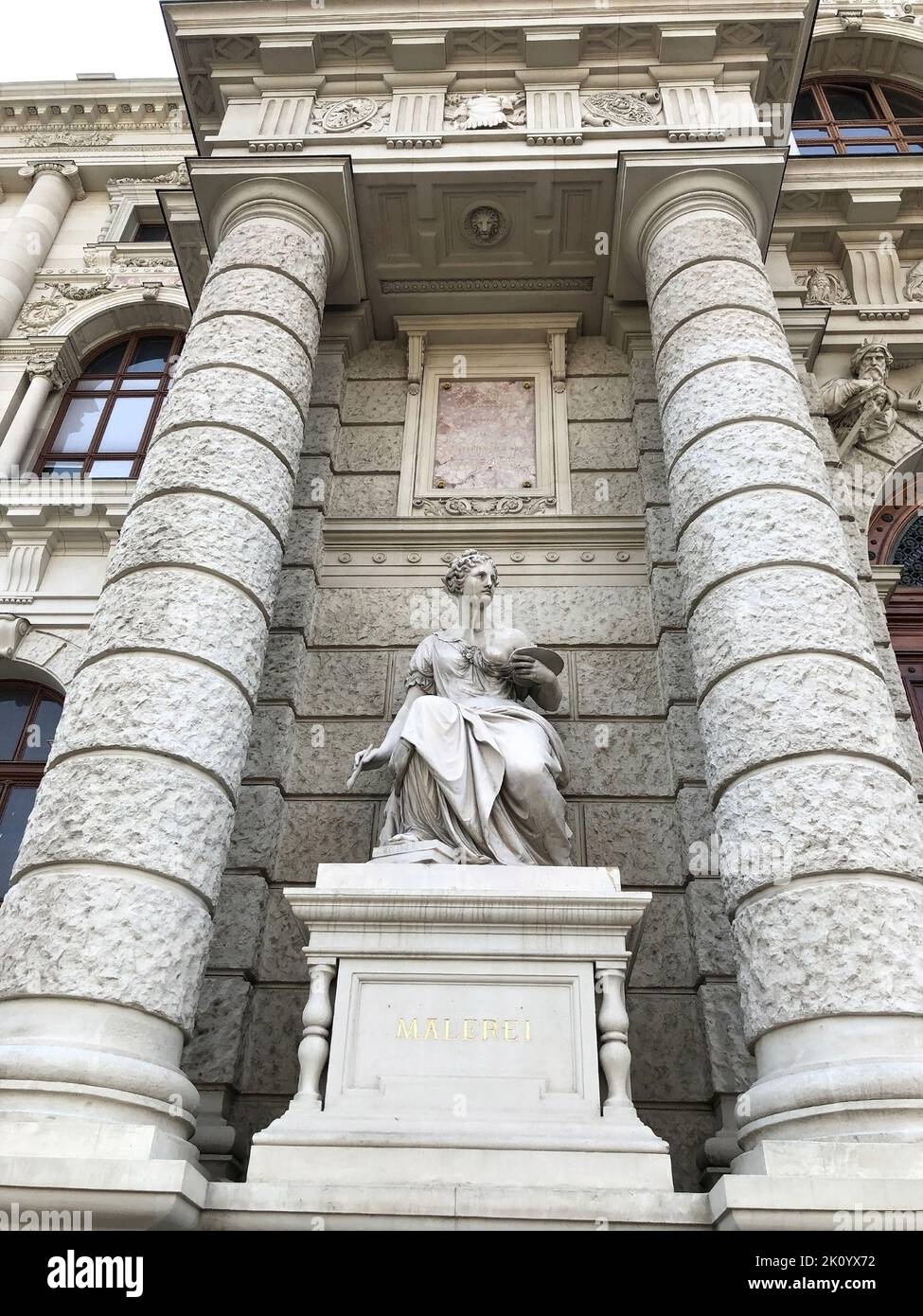 Sculpture of 'Malerei' ('Painting') at the facade of the main building of Kunsthistorisches Museum (Museum of Arts) in Vienna, Austria Stock Photo