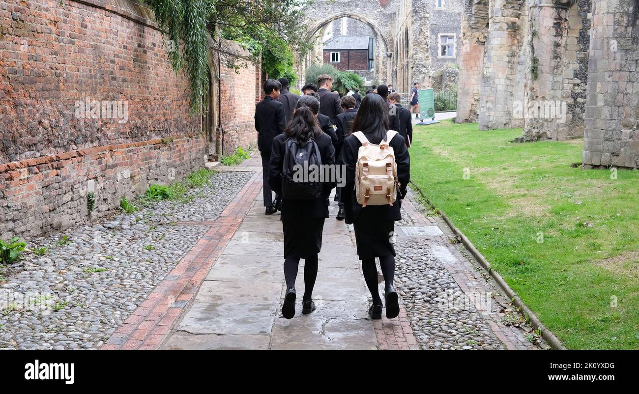 kings school scholars walking in the grounds of canterbury cathedral,kent,uk september 2022 Stock Photo