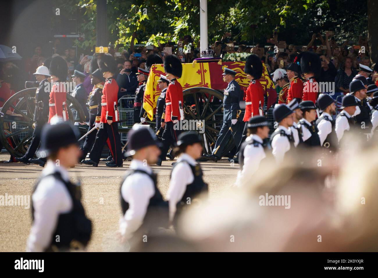 LONDON - SEPTEMBER 14: The procession of Queen Elizabeth II’s coffin passes across Horse Guards Parade, travelling from Buckingham Palace to Westminster Hall. Walking behind the coffin are Prince’s William and Harry, Prince Edward, Prince Andrew, Princess Anne, along with King Charles III, as it is carried on a gun carriage, followed by other members of the Royal Family, on September 14, 2022. Photo by David Levenson Stock Photo