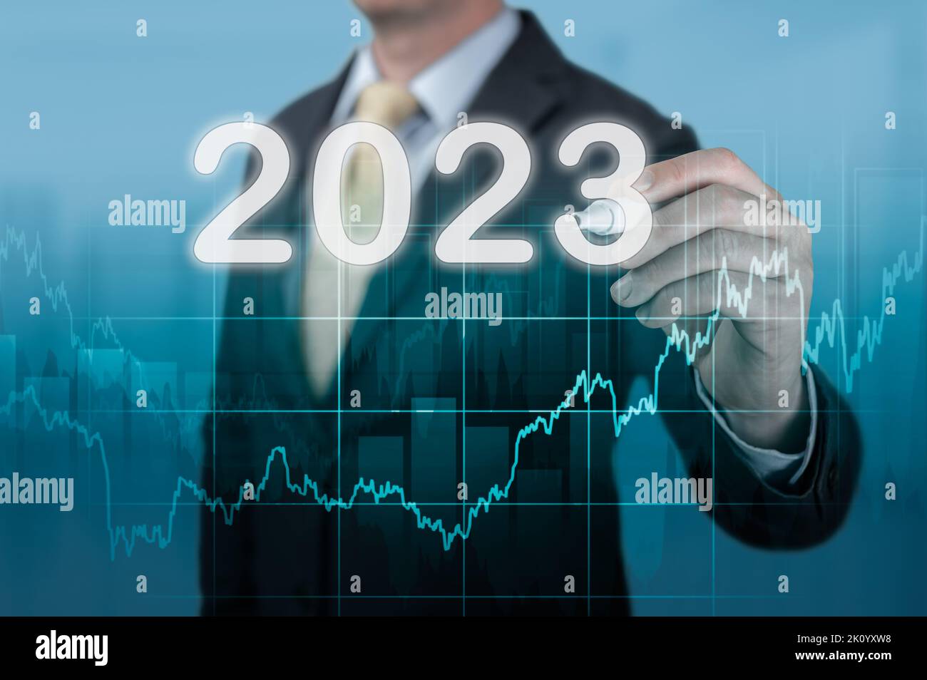 Businessman in suit forecast analysis plan profit chart 2023 year