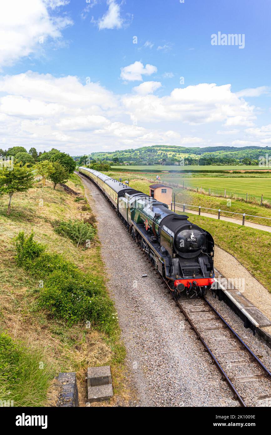 Steam engine 35006 Peninsular & Oriental S. N.Co. (SR 21C6 & BR 35006) passing  Hailes Abbey Halt on the Gloucestershire & Warwickshire Railway 6/7/22 Stock Photo