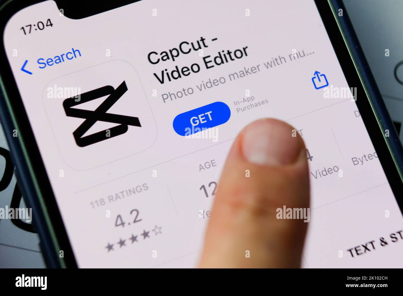 Closeup CapCut app (formerly known as Viamaker, Chinese JianYing) in App Store on iPhone. CapCut is an all-in-one video editing app Stock Photo