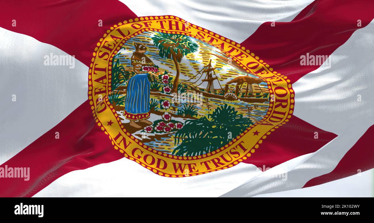 Close-up view of the Florida state flag waving. Florida is a state located in the Southeastern region of the United States. Fabric textured background Stock Photo