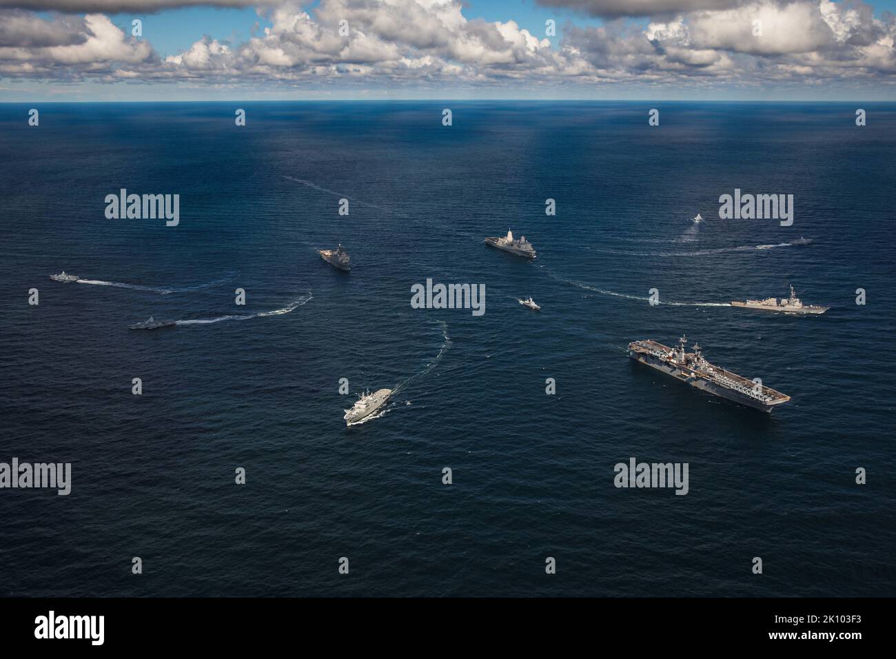 Baltic Sea, International Waters. 30 August, 2022. The U.S. Navy Wasp-class amphibious assault ship USS Kearsarge, right, leads a break-away maneuver with ships from the Swedish Navy during a NATO maneuvering exercise, August 30, 2022 in the Baltic Sea.  Credit: MC2 Aaron Lau/Planetpix/Alamy Live News Stock Photo