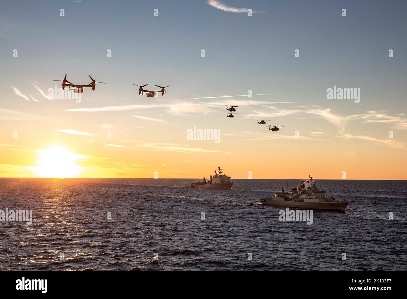 Baltic Sea, International Waters. 06 September, 2022. U.S. Navy and Marine Corps aircraft fly over the Portuguese navy Vasco da Gama-class NRP Core-Real, right, and U.S. Navy Whidbey Island-class dock landing ship USS Gunston Hall during a NATO maneuvering exercise, September 6, 2022 in the Baltic Sea.  Credit: MC1 John Bellino/Planetpix/Alamy Live News Stock Photo