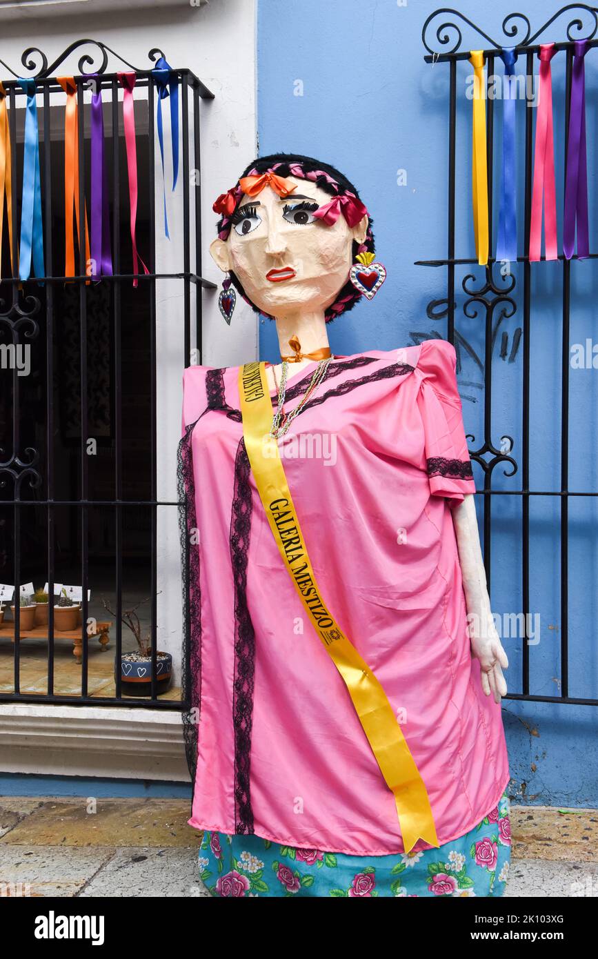 Giant papier mache puppet in front of a store on the pedestrian Zocalo avenue, Oaxaca de Juarez, Mexico Stock Photo