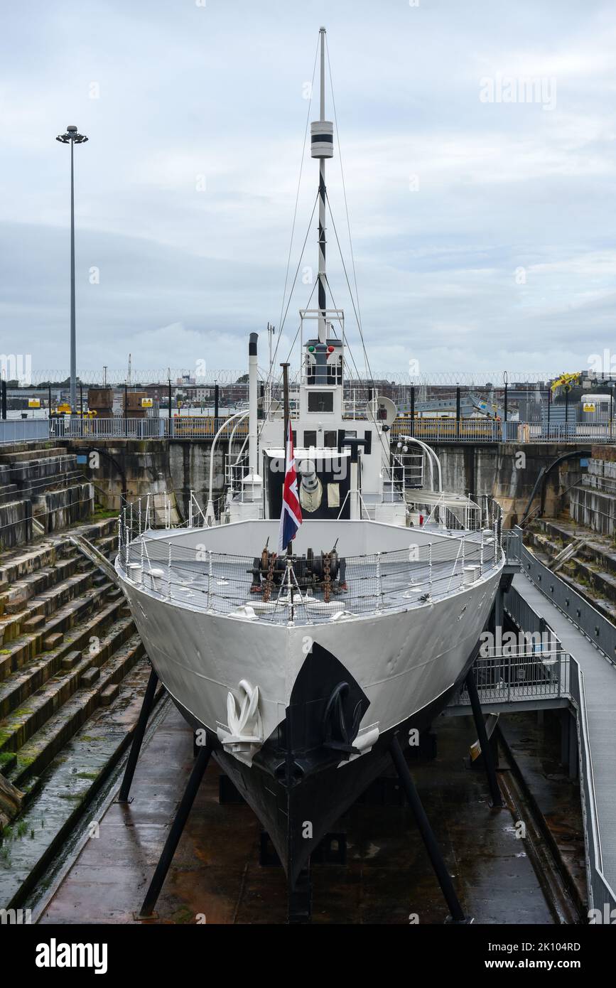 HMS M.33 in dry dock inside Portsmouth's Historic dockyard, a WW1 warship. Stock Photo
