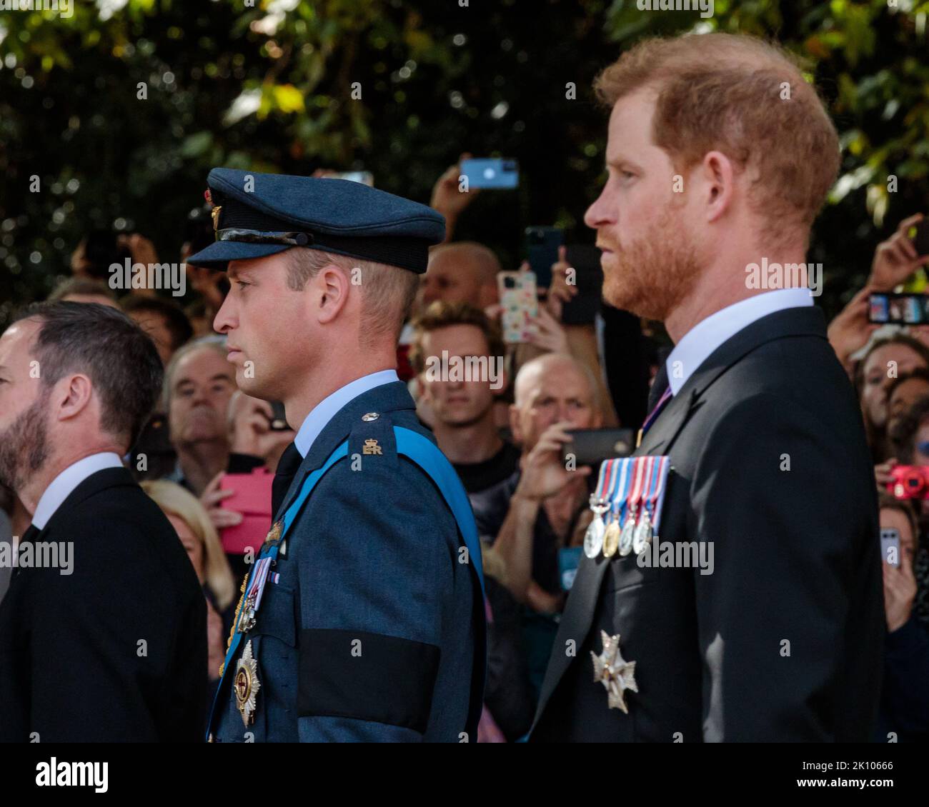 Horse Guards Parade, London, UK. 14th September 2022.  The procession taking Her Majesty Queen Elizabeth II  from Buckingham Palace to the Palace of Westminster, where she will Lie in State until her funeral on Monday, passes through Horse Guards Parade. HRH, William, Prince of Wales and Prince Harry, Duke of Sussex. Amanda Rose/Alamy Live News Stock Photo