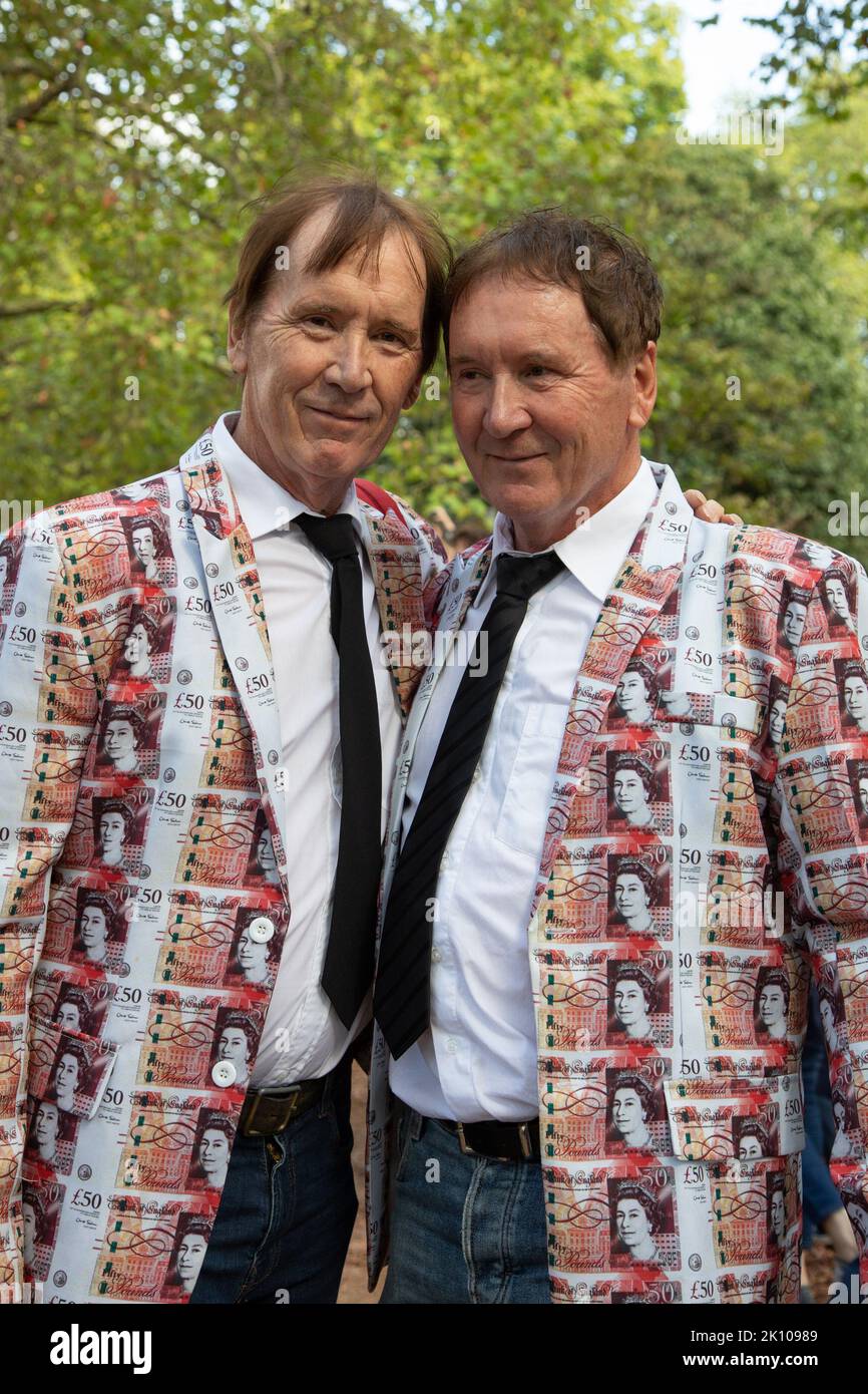 London, England. 14th September, 2022. Twins Richard and John Griffiths have come to the Mall to pay their respects as the Queen makes her final journey to Westminster Hall where she will be lying in state until the day of her funeral. Credit: Kiki Streitberger / Alamy Live News Stock Photo