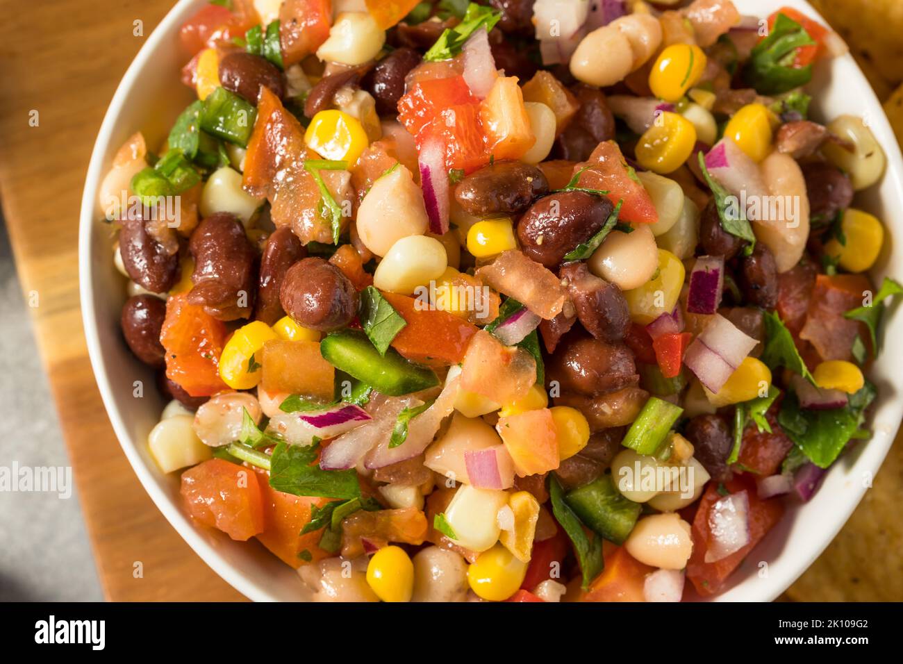 Homemade Organic Cowboy Caviar Dip with Corn Beans and Chips Stock Photo