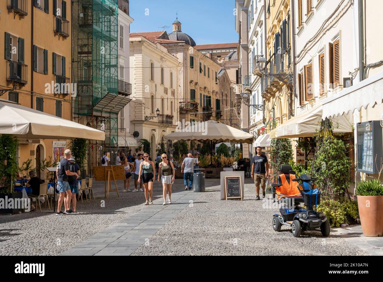 View of bustling Civic Square in the old town centre of Alghero